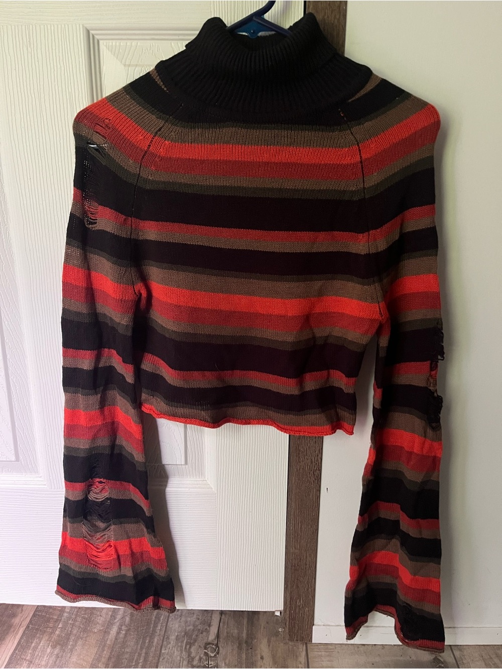 Striped Knit Turtleneck Top with Distressed Accents
